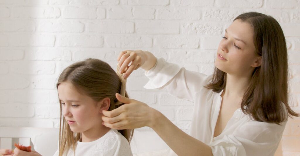 Woman in White Dress Shirt Holding Girl in White Dress